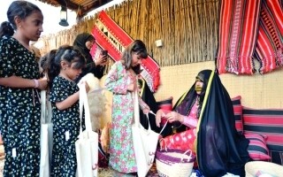 Children Celebrate 'Haqq Al-Laila' in Traditional Attire