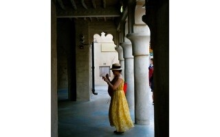 Visitor to Dubai Enjoys Al Seef's Ambiance