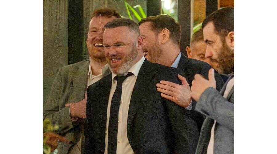 Wayne Rooney spotted with women after BRIT Awards