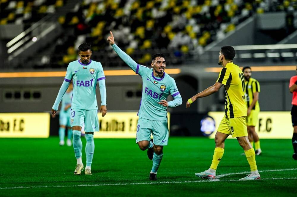 Al Ain tops league after beating Kalba
