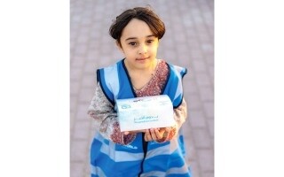 Little Volunteer Helps Drivers During Ramadan