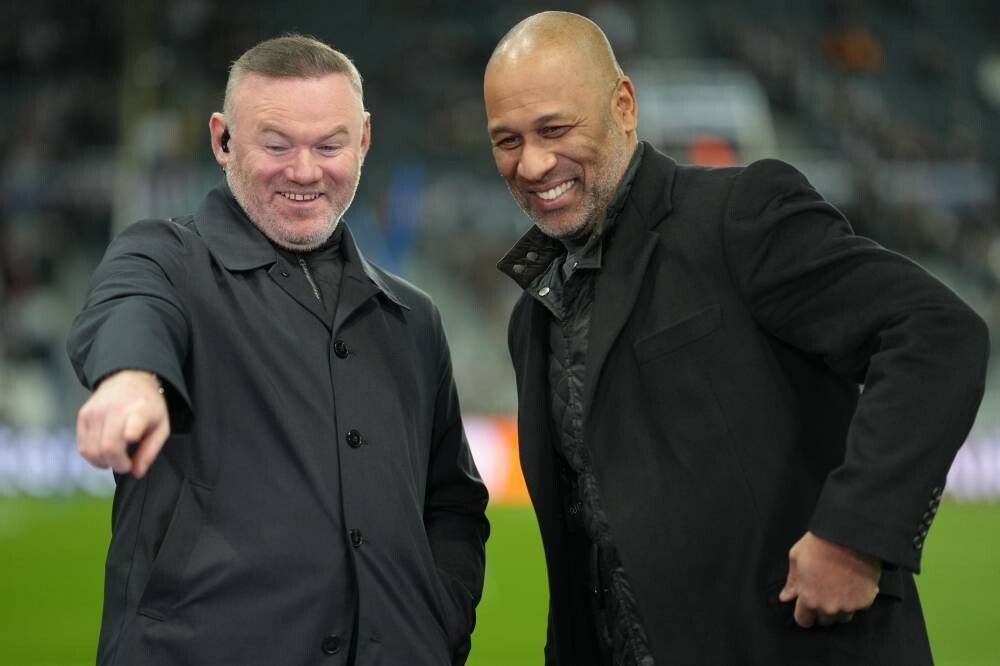 Wayne Rooney teases presenter forced to wear socks due to heels