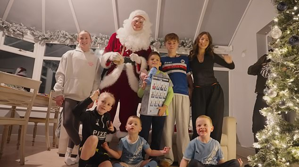 Erling Haaland Visits Manchester City Fans as Santa
